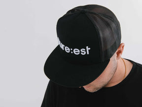 Pureest cap with embrodied logo - White on black